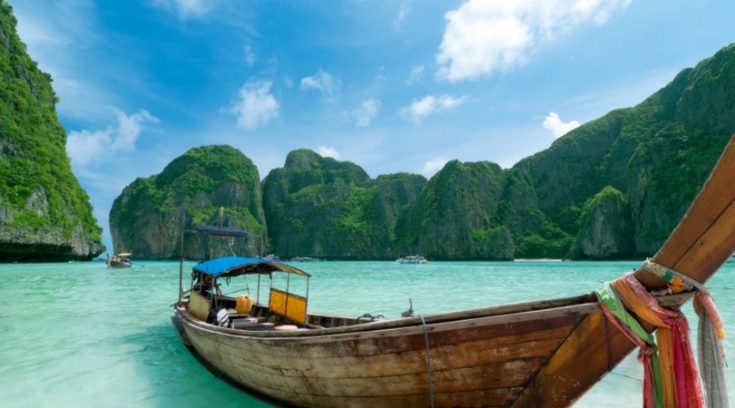 image of wooden boat in Thailand