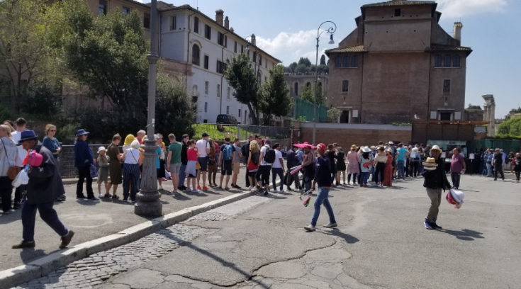 photo of long ticket line in Rome