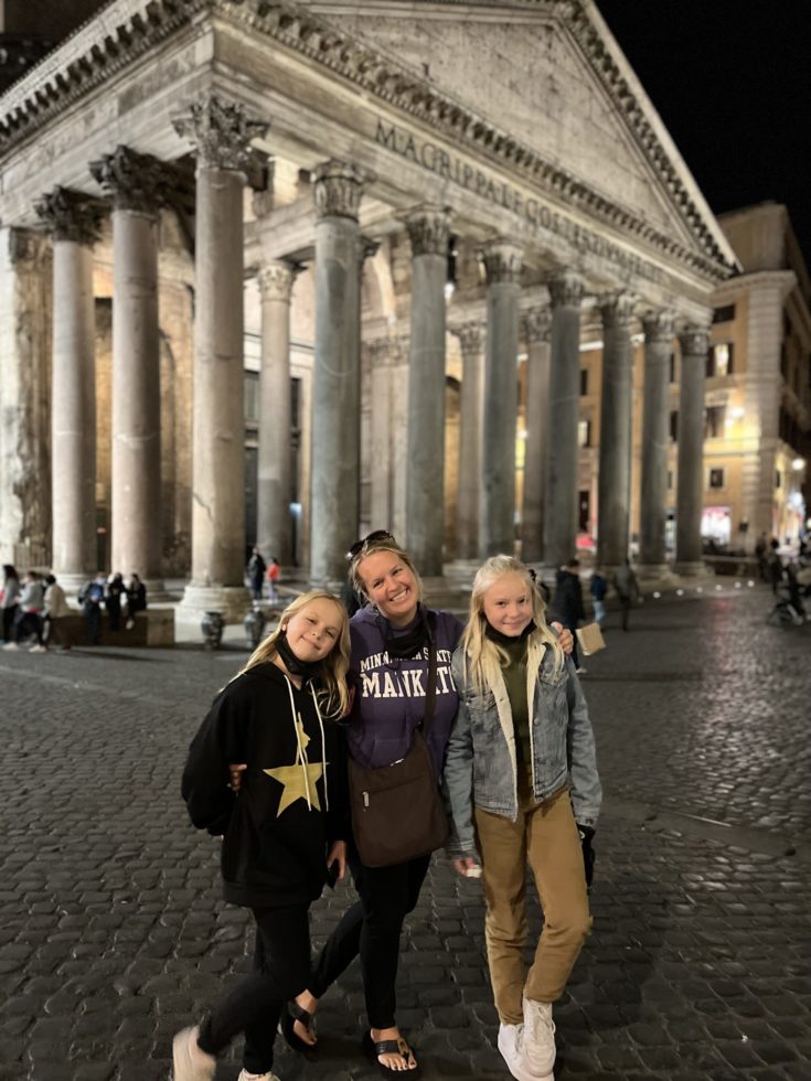 The girls in front of the Pantheon at night