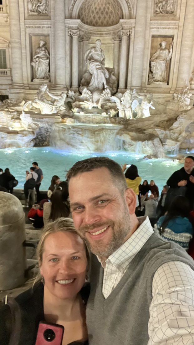 Selfie in front of the Trevi fountain at night